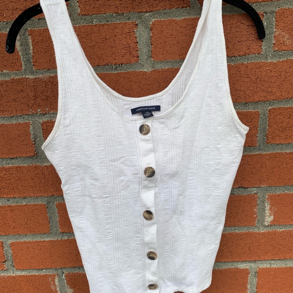 Ribbed white tank top with buttons
